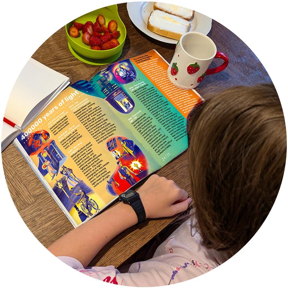 A child reading Ripple magazine